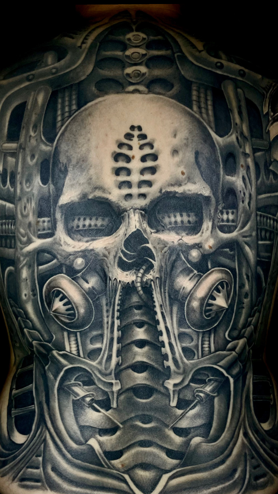 Biomechanik Tattoo collaboration between father and son. Varry und Floyd